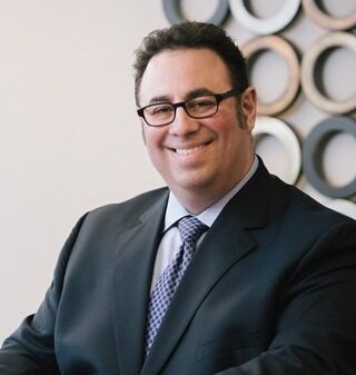 CHARLES R. SEGAL